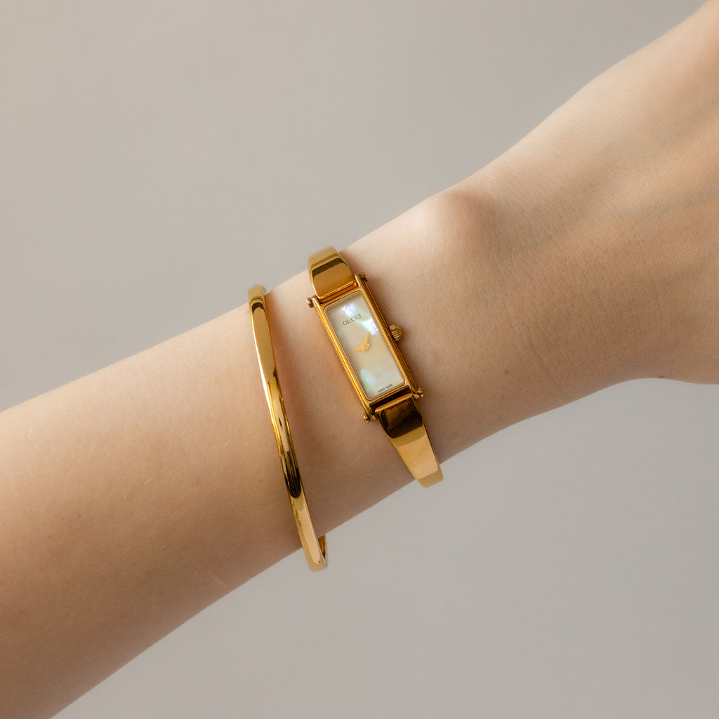 Vintage Gucci Swiss Pearl Horsebit Cuff Gold Watch