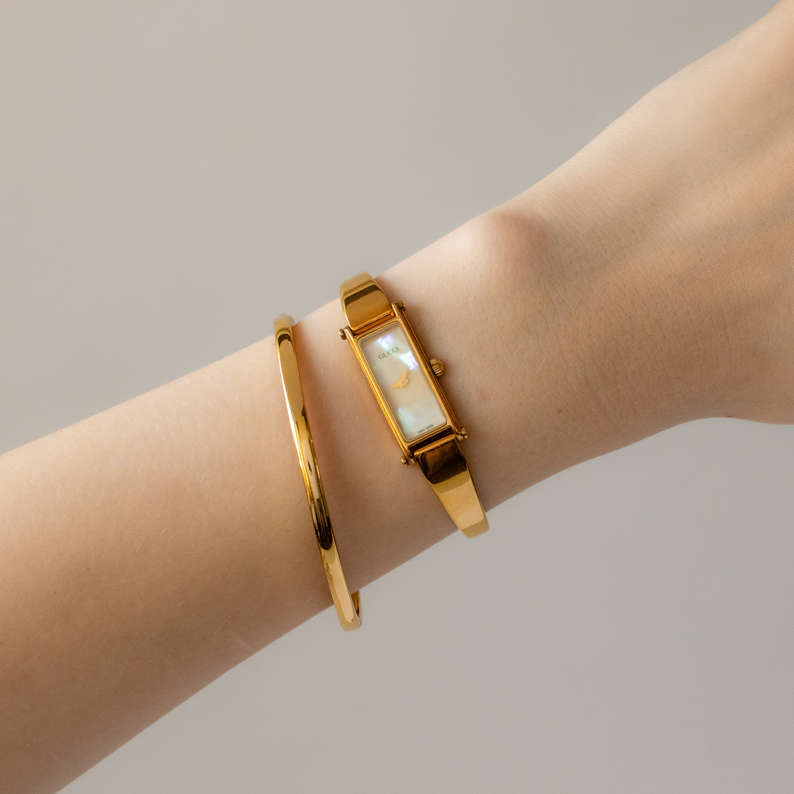 Vintage Gucci Swiss Pearl Horsebit Cuff Gold Watch