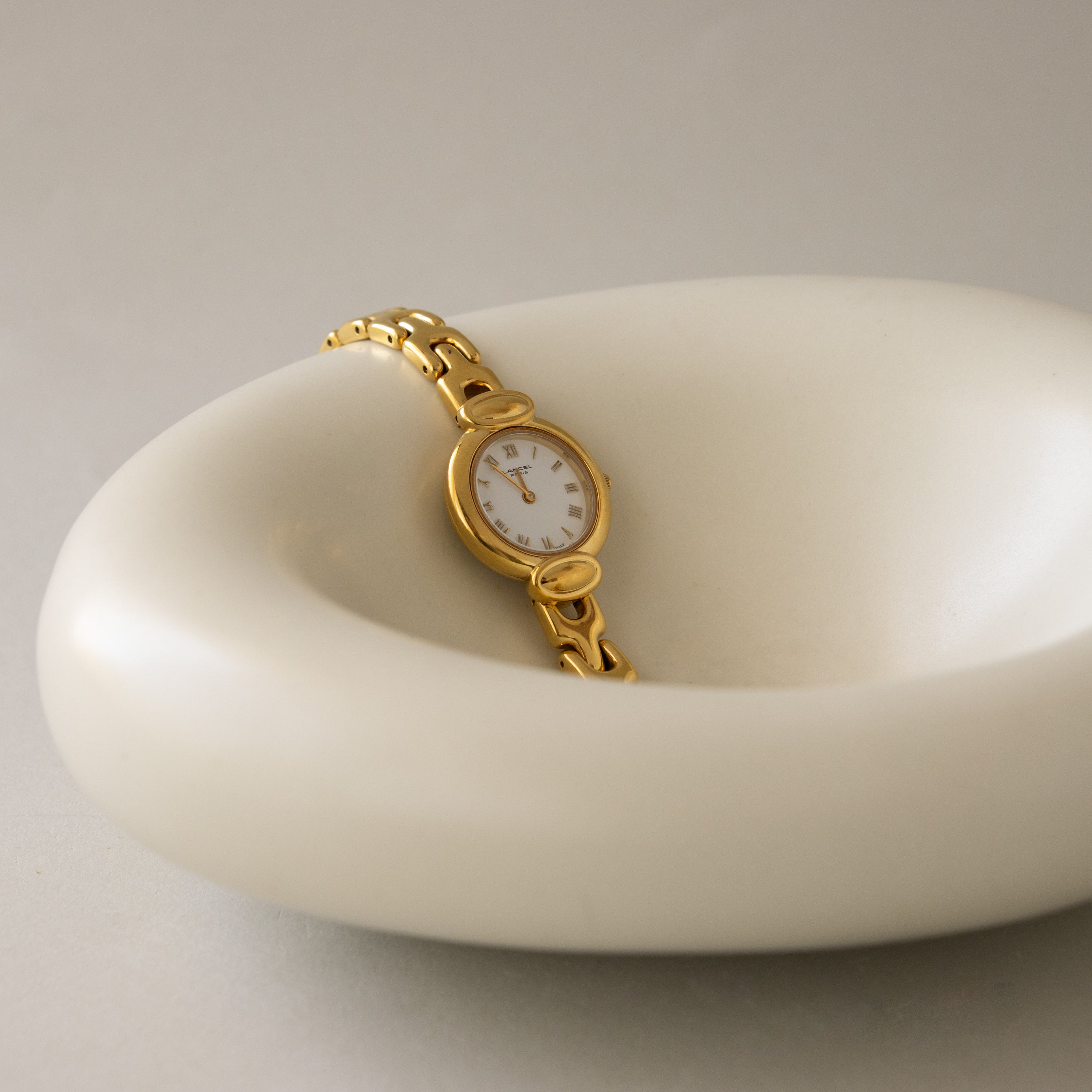 Vintage Lancel Swiss Round Roman Gold Watch