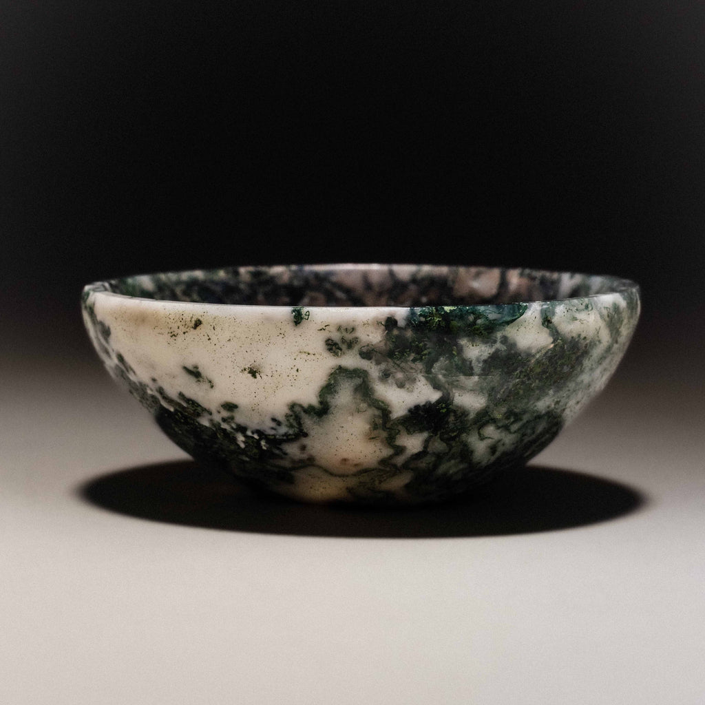 Natural gemstone ring dish with unique white and dark green marbled patterns.