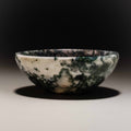 Natural gemstone ring dish with unique white and dark green marbled patterns.