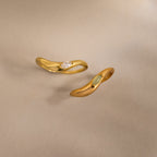 Two Zen Gemstone Curve Rings with curved bands and subtle gemstone accents are shown on a neutral background—ideal minimalist rings.