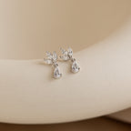 Aretes colgantes con diamantes de talla marquesa