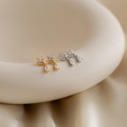 Aretes colgantes con diamantes de talla marquesa