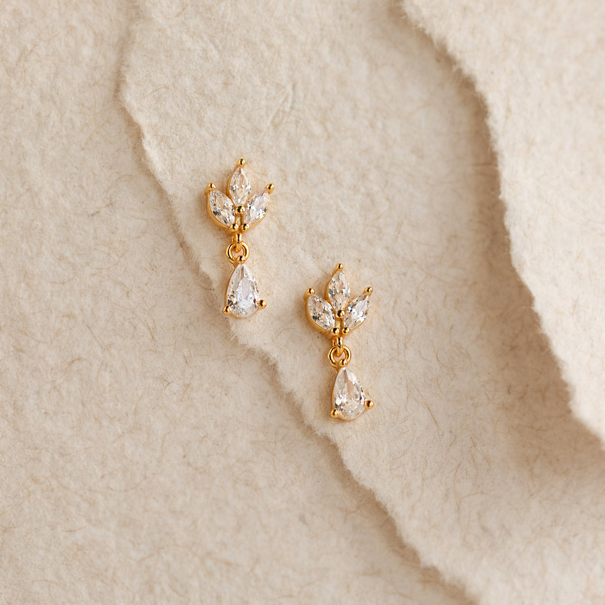 Puces d'oreilles pendantes diamant marquise
