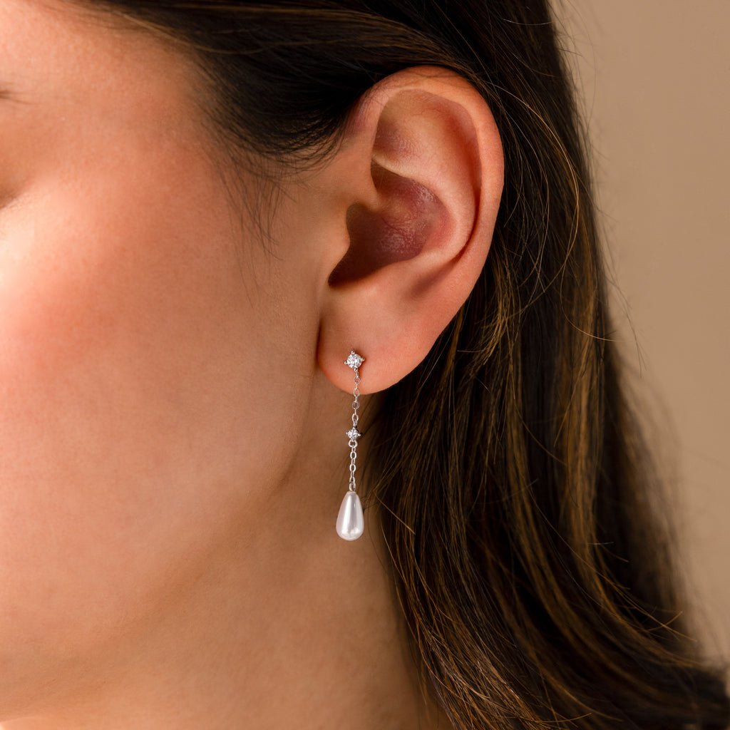 Pendientes de cadena de perlas de diamantes