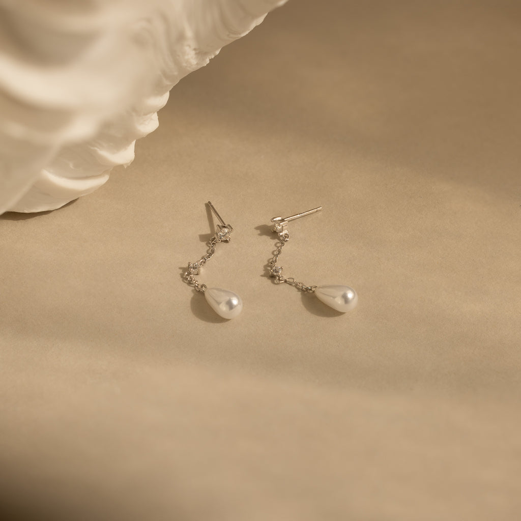 Pendientes de cadena de perlas de diamantes
