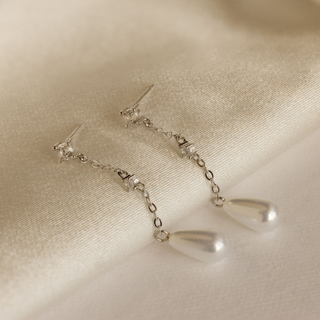 Pendientes de cadena de perlas de diamantes