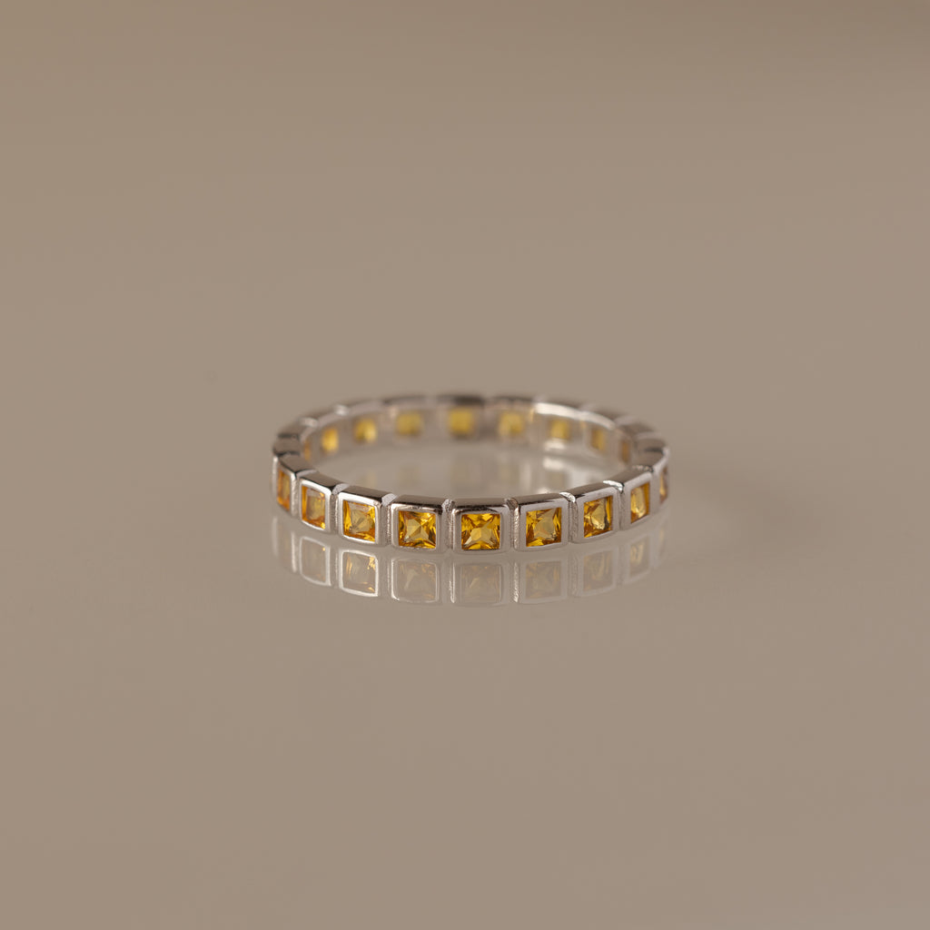Eternity Bezel Topaz Ring