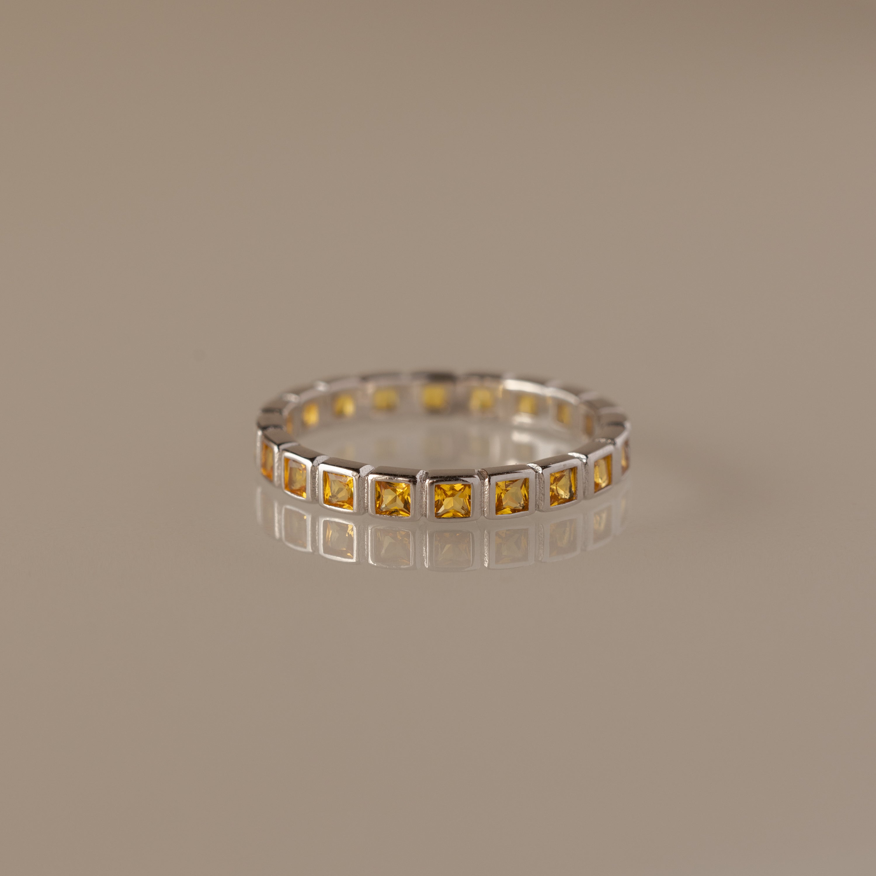 Eternity Bezel Topaz Ring