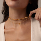 Model wearing our Opal Diamond Necklace in Gold, styled with our Opal Bezel Tennis Necklace