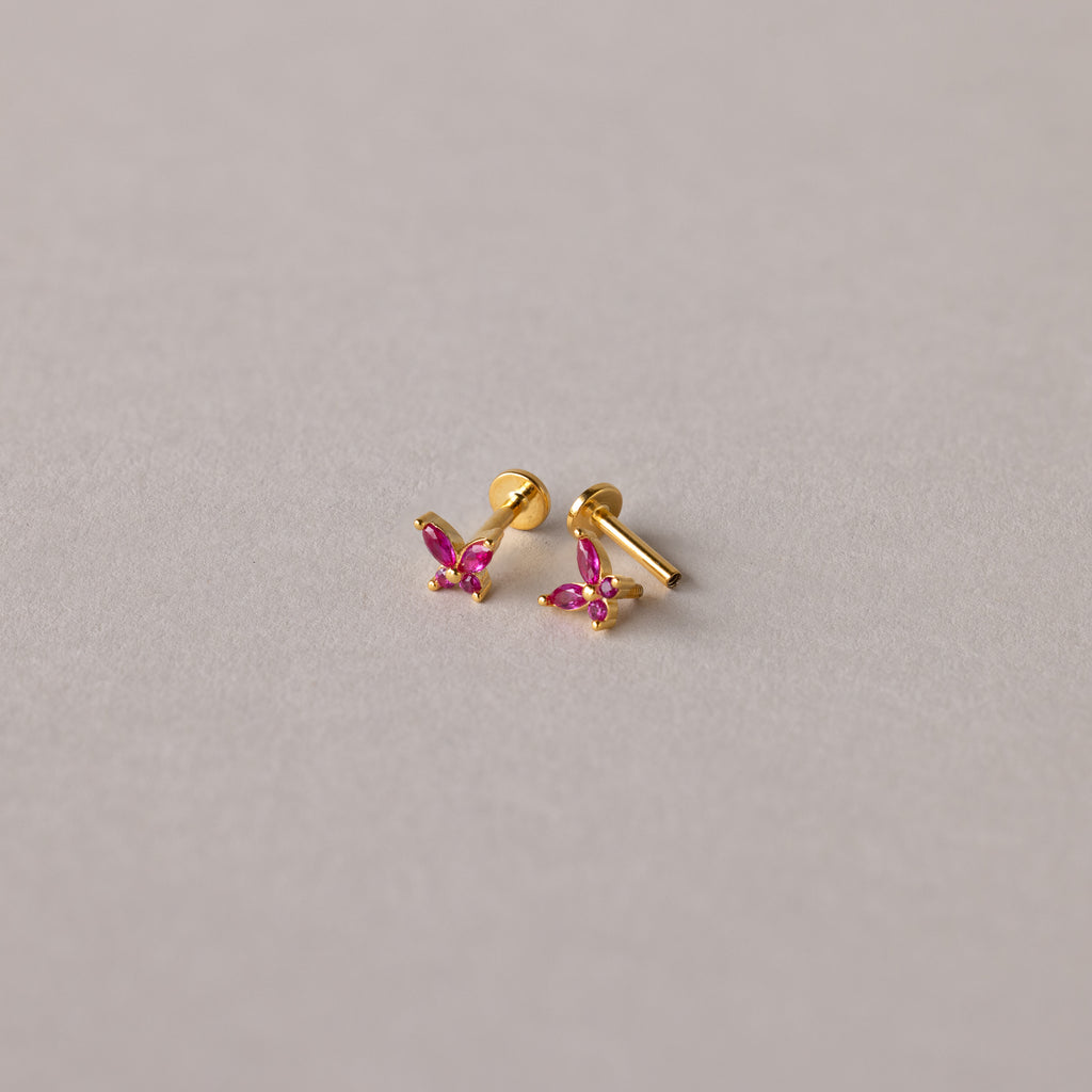Butterfly Blue Zircon Flatback Studs are displayed on a plain light gray background.