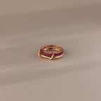 Duo Ruby Tennis Linked Ring Set—features minimalist gold bands linked and adorned with pink gemstones, creating an elegant heart-inspired design perfect as a birthstone ring for any occasion.