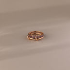 Duo Alexandrite Tennis Linked Ring Set with purple gemstones and an intertwined band design, displayed on a neutral background.
