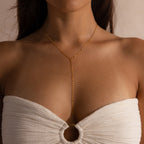 Model wearing a gold dainty mirror chain lariat necklace.