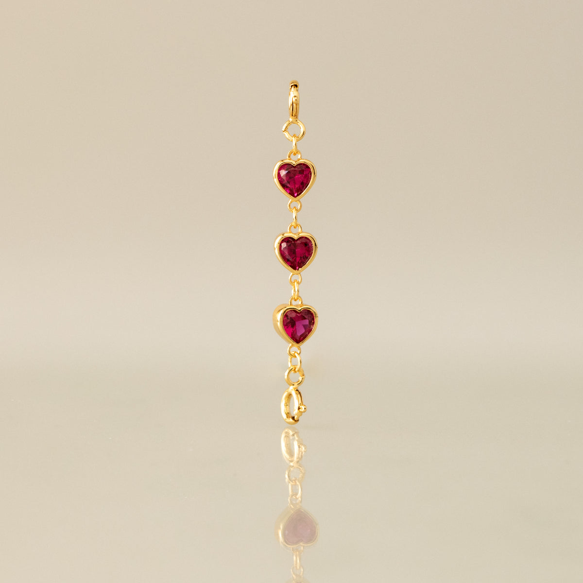 Trio Ruby Heart Clasp Charm