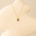 Large Aquamarine Emerald-Cut Halo Necklace
