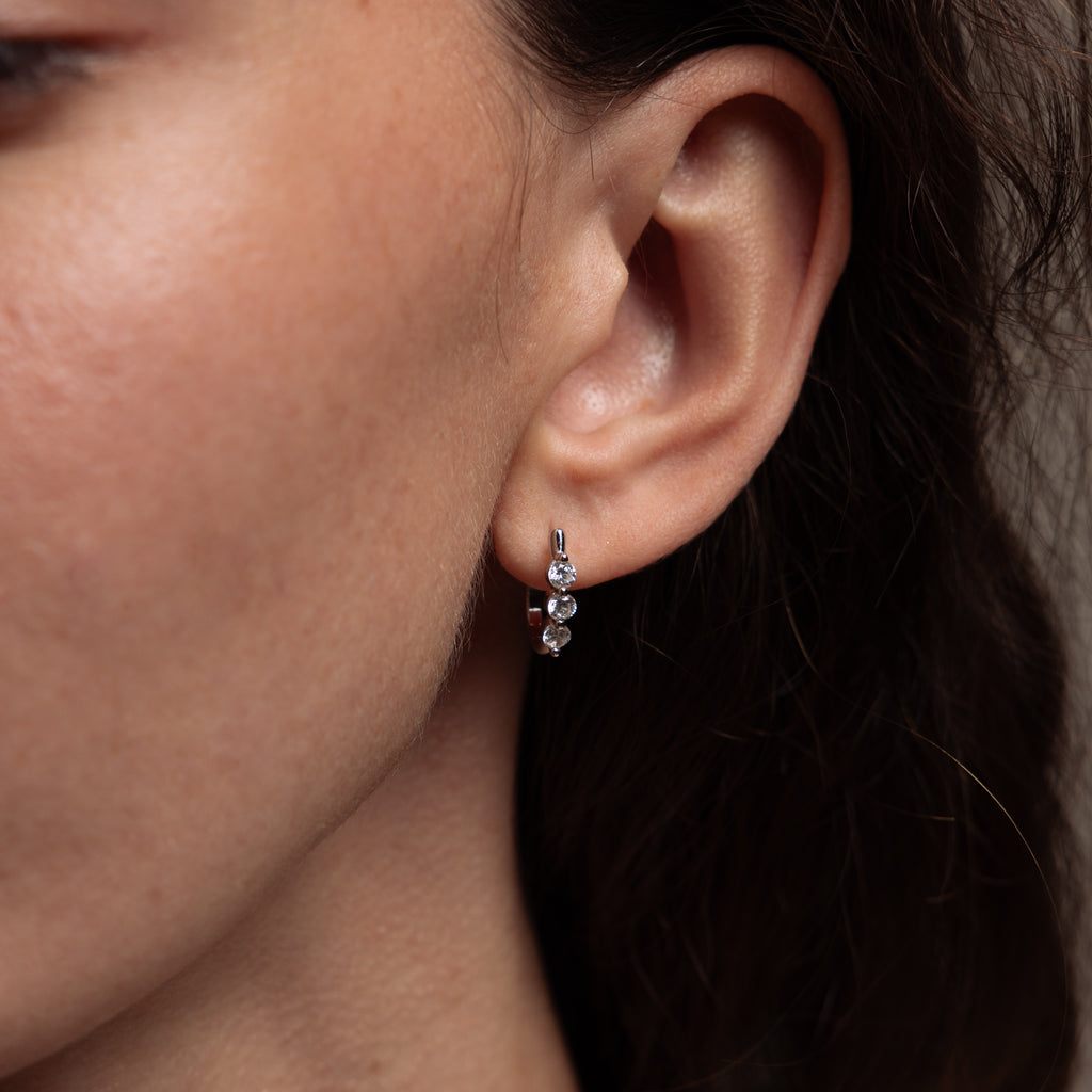 Close up of model wearing our Lace Diamond Hoops in Silver