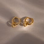 Close up flatlay of our Tiny Teardrop Huggies in Gold