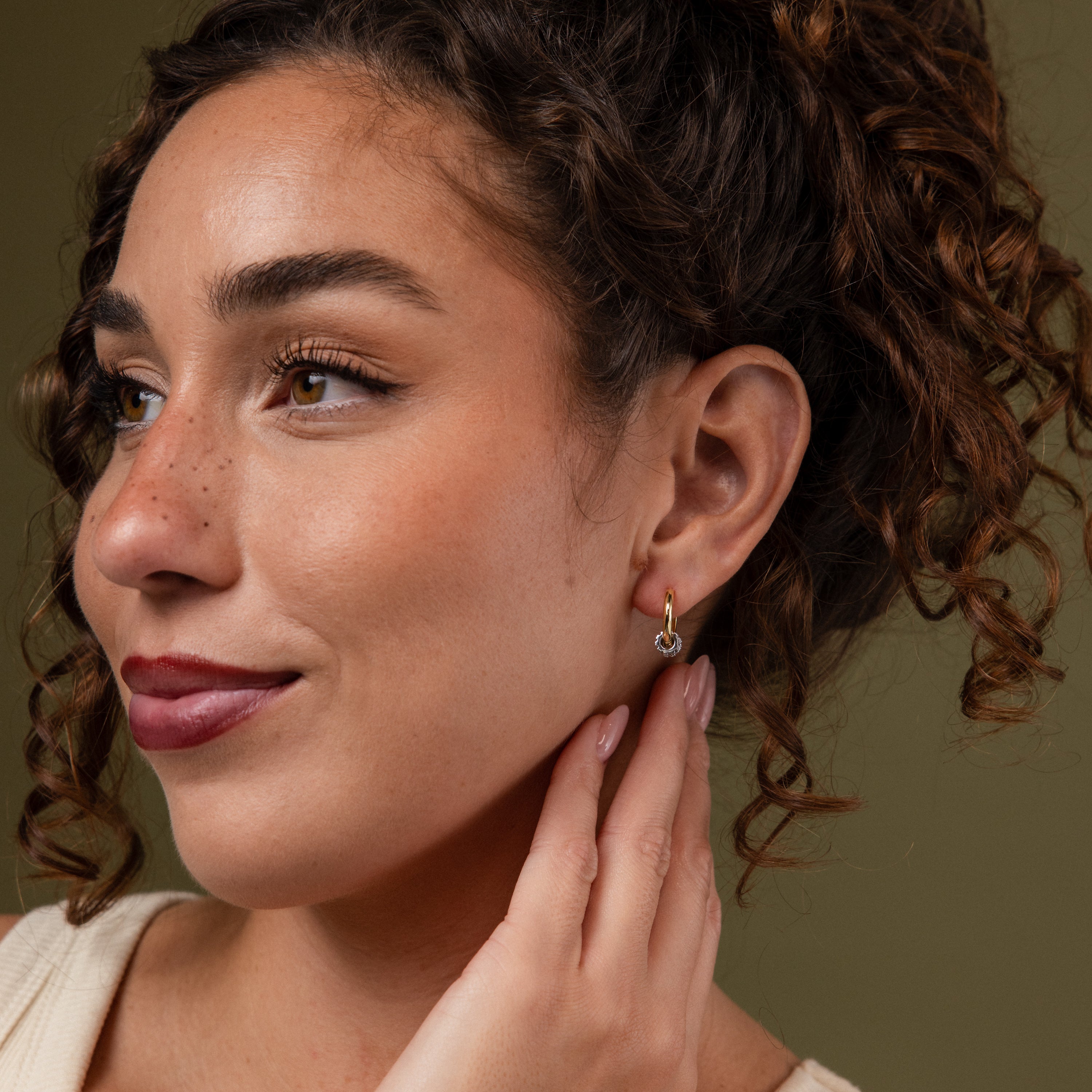 Model wearing our Mixed Metal Pave Hoops in Gold