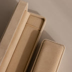 Beige Bracelet Travel Case on a matching beige background, viewed from above—evoking the soft elegance of a velvet jewelry case.