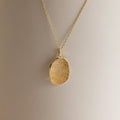 Custom Fingerprint Necklace in Rose Gold featuring an oval pendant engraved with a unique fingerprint, shown on a neutral background—an ideal sentimental gift.
