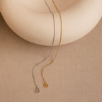 The Micro Rolo Chain Anklet features a delicate design in silver or gold with a tiny heart charm—ideal for fans of minimalistic jewelry.