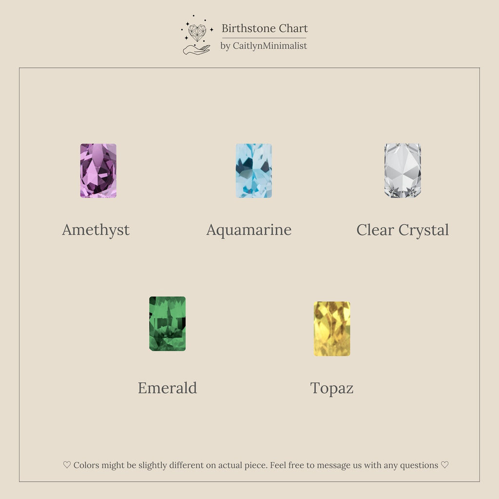 Five gemstones—Amethyst, Aquamarine, Clear Crystal, Emerald, and Topaz—stand out as removable emerald-cut accents for the Dangling Gemstone Hoops, featuring a radiant gold finish on a neutral background.