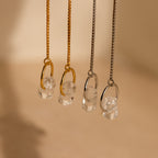 Two pairs of necklaces with clear crystal pendants—one on gold, one on silver chains—look stunning when paired with Herkimer Diamond Threader Earrings for a coordinated, elegant look.