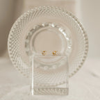 Diamond Butterfly Earrings Set displayed on a clear block with a textured glass plate in the background—ideal for layering or pairing for an elegant style.