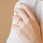 A hand wearing the Agate Diamond Rings Set, highlighting the timeless elegance of vintage-inspired jewelry.