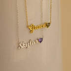 Discover the Mellow Name Heart Birthstone Necklace—a minimalist, personalized piece featuring your name and birthstone in an elegant heart design.