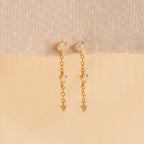Dainty Opal Stud Earrings Set displayed against a neutral beige background—ideal for fans of minimalist jewelry and elegant opal stud earrings.