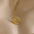 The Pave Fingerprint Coin Necklace features a round pendant engraved with a custom fingerprint and bordered by sparkling stones—an elegant, personalized memorial gift.