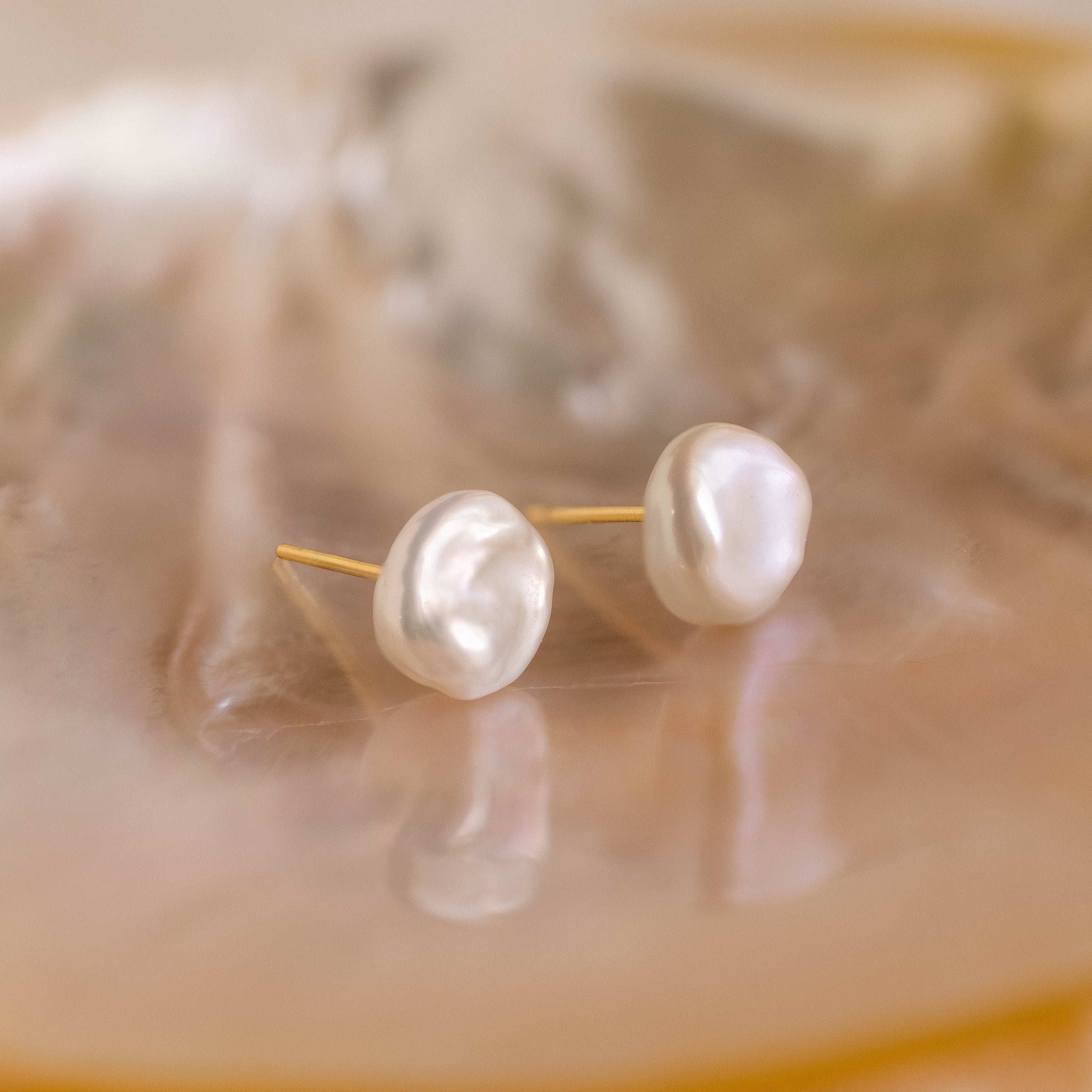 Elevate any outfit with the Freshwater Pearl Studs—classic pearl earrings designed to bring timeless elegance to your style.