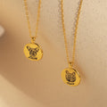 Two Pet Portrait Coin Necklaces engraved with pet faces and names, Daisy and Luna, on round pendants—ideal as custom pet necklaces or heartfelt pet memorial jewelry.