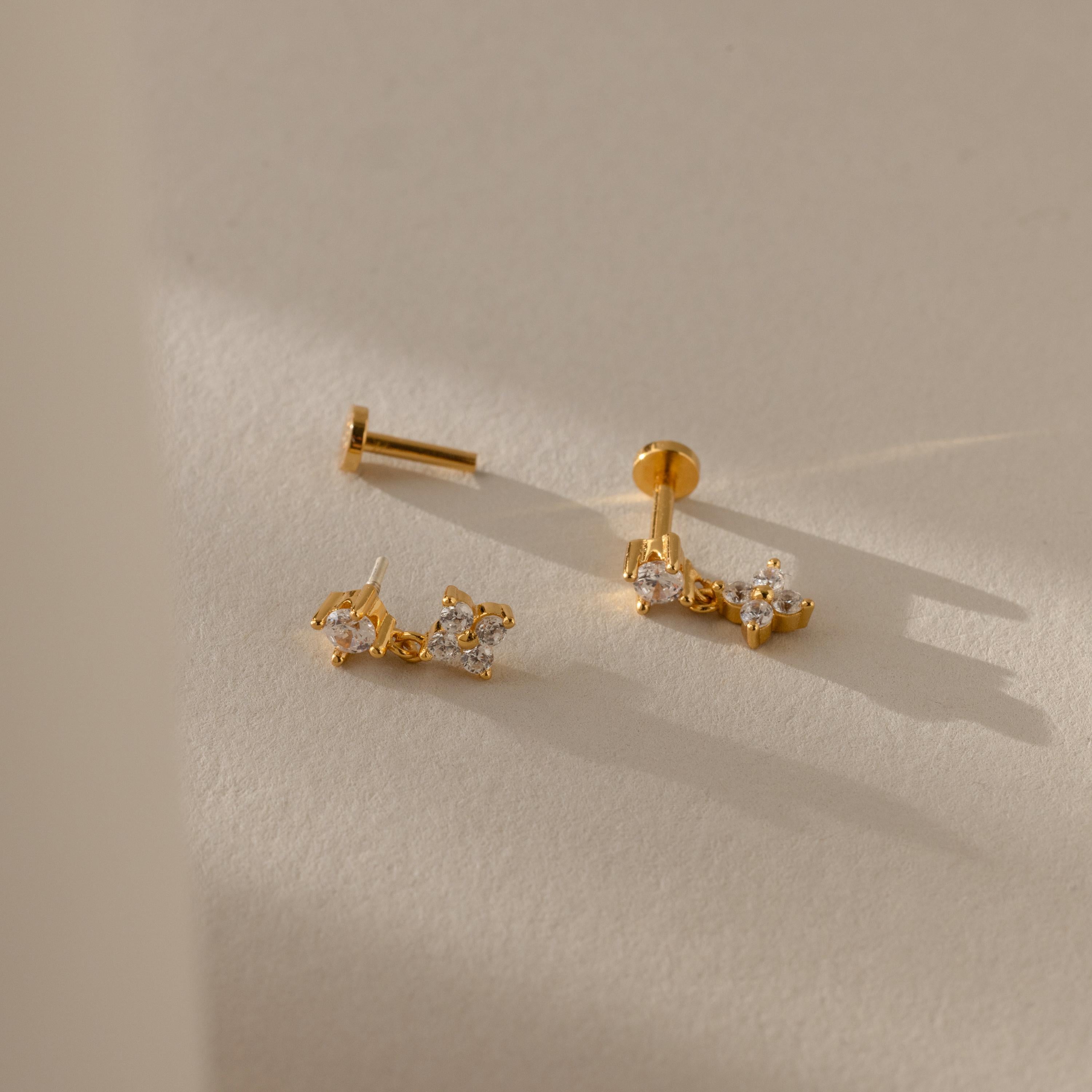 Ivy Flower Flat Back Studs with clear gemstones displayed on a soft beige surface in natural light—an ideal Mother’s Day gift.