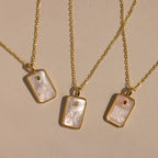 The Pearl Zodiac Birthstone Necklace in Sterling Silver features a chic zodiac pendant with a gemstone accent—perfect personalized jewelry for any necklace collection.