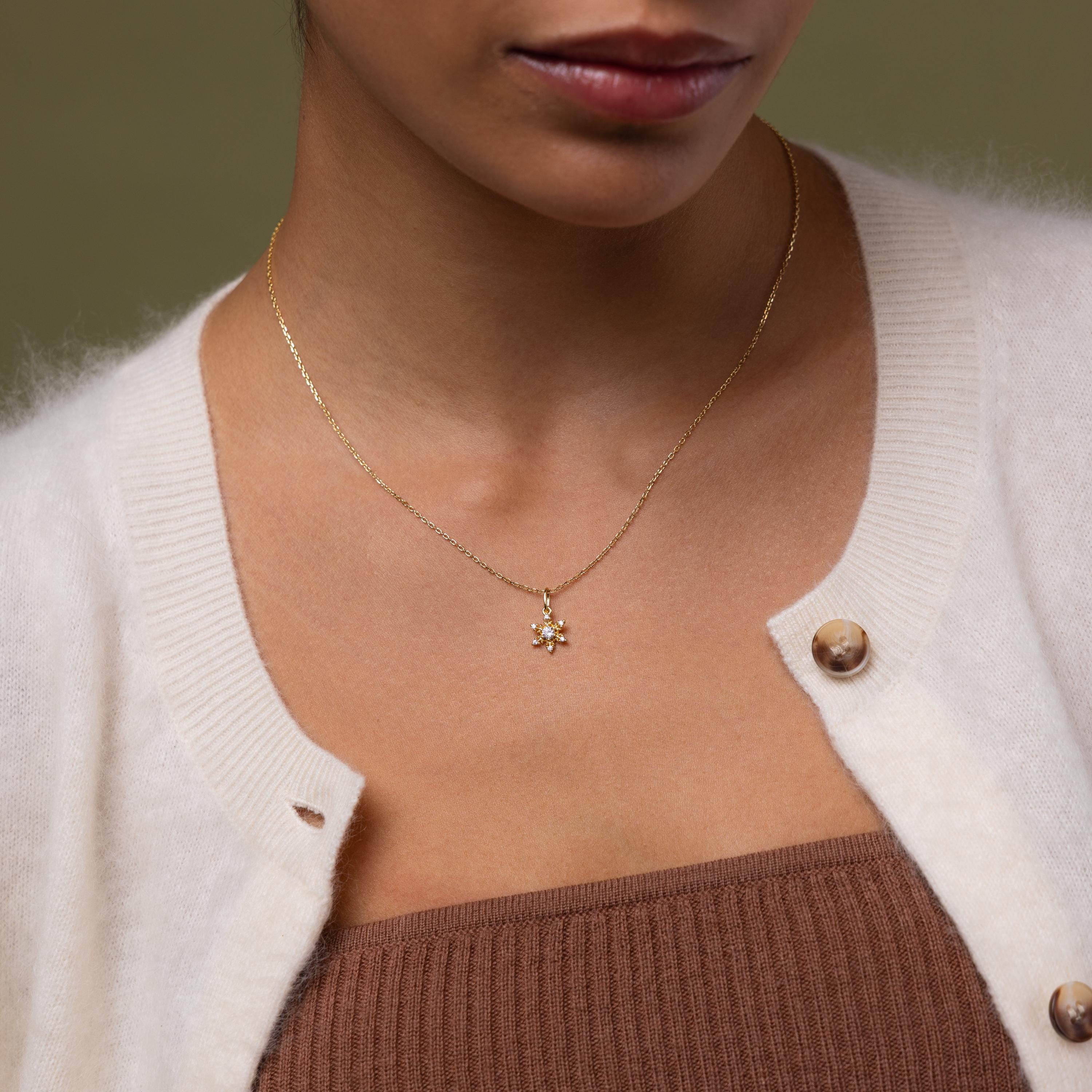 Model wearing our Diamond Snowflake Necklace in Gold