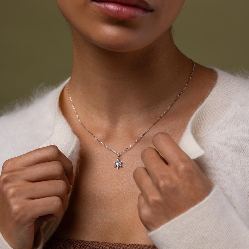 Model wearing our Diamond Snowflake Necklace in Silver