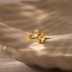 Close up of our Starlight Flatback Studs in Gold