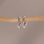 Close up of our Tiny Teardrop Huggies in White Gold