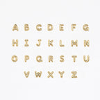 Flatlay showing all letters of our Bubble Initial Flatback Studs