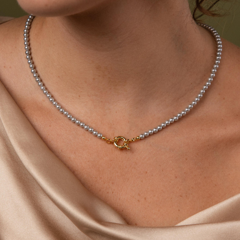 Model wearing our Smoky Pearl Clasp Necklace in Gold