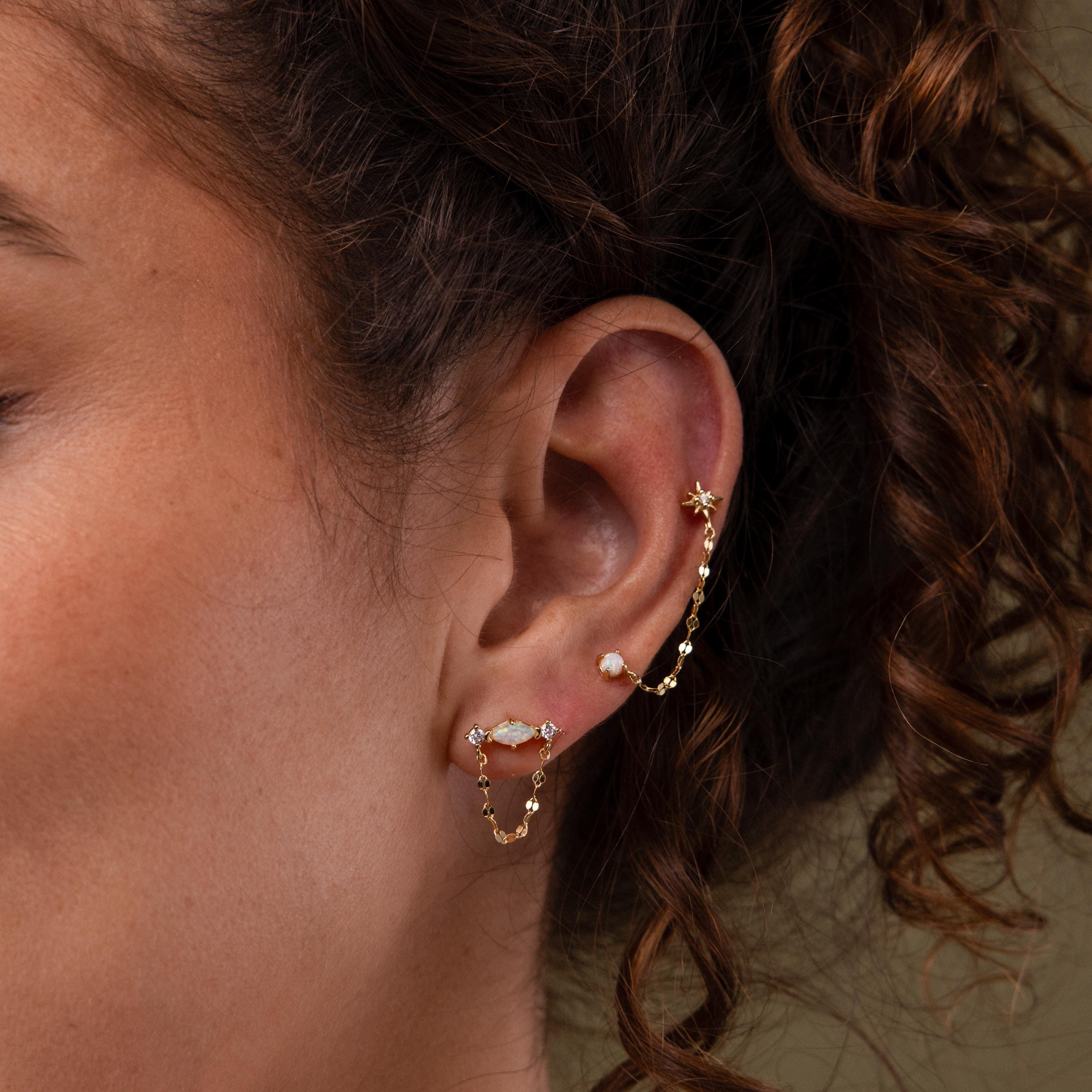 Close up of model wearing our Opal & Diamond Chain Studs with our Opal & Star Duo Chain Studs
