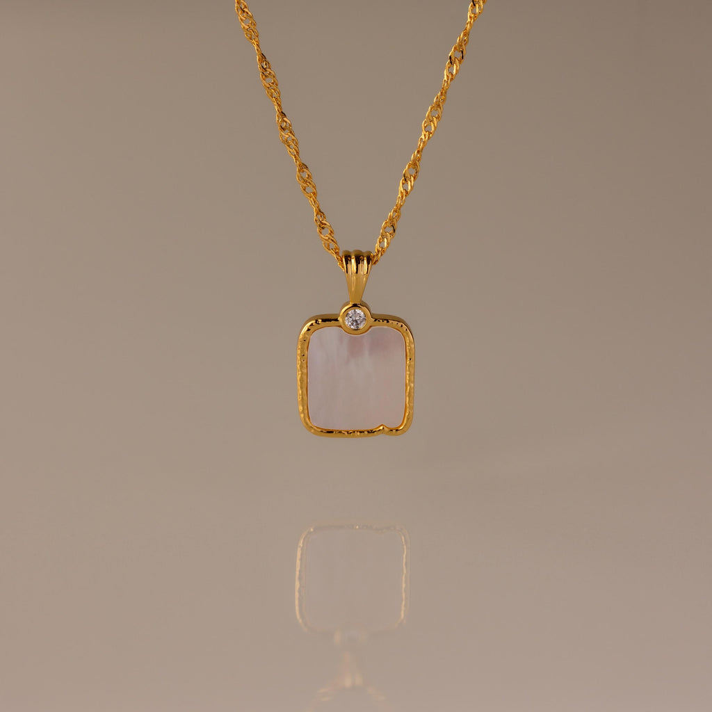 Elegant Square Mother of Pearl Necklace in 18K Gold featuring a twisted chain, a white stone pendant, and a small round gem accent.