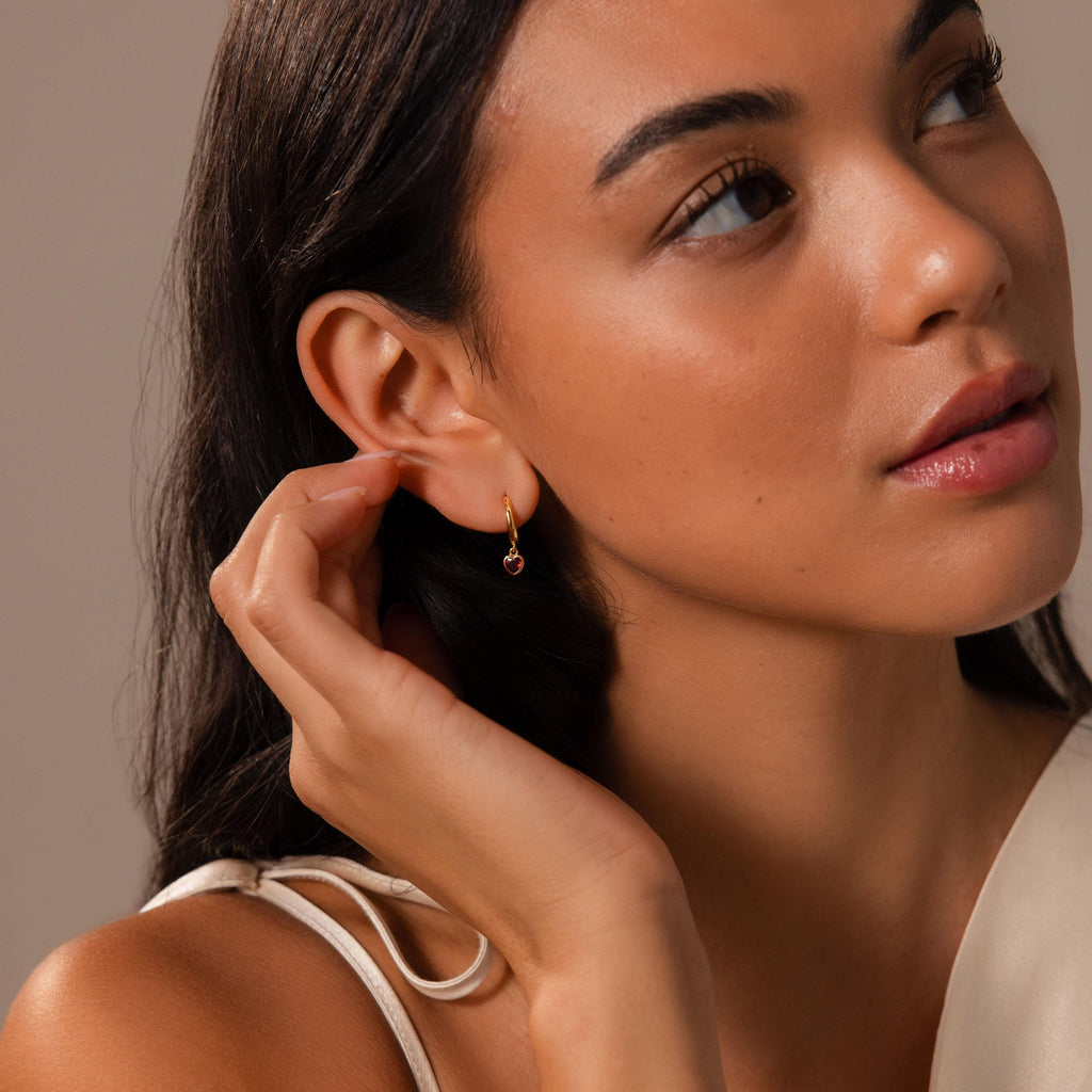 Dangling Garnet Heart Huggies in 18K Gold
