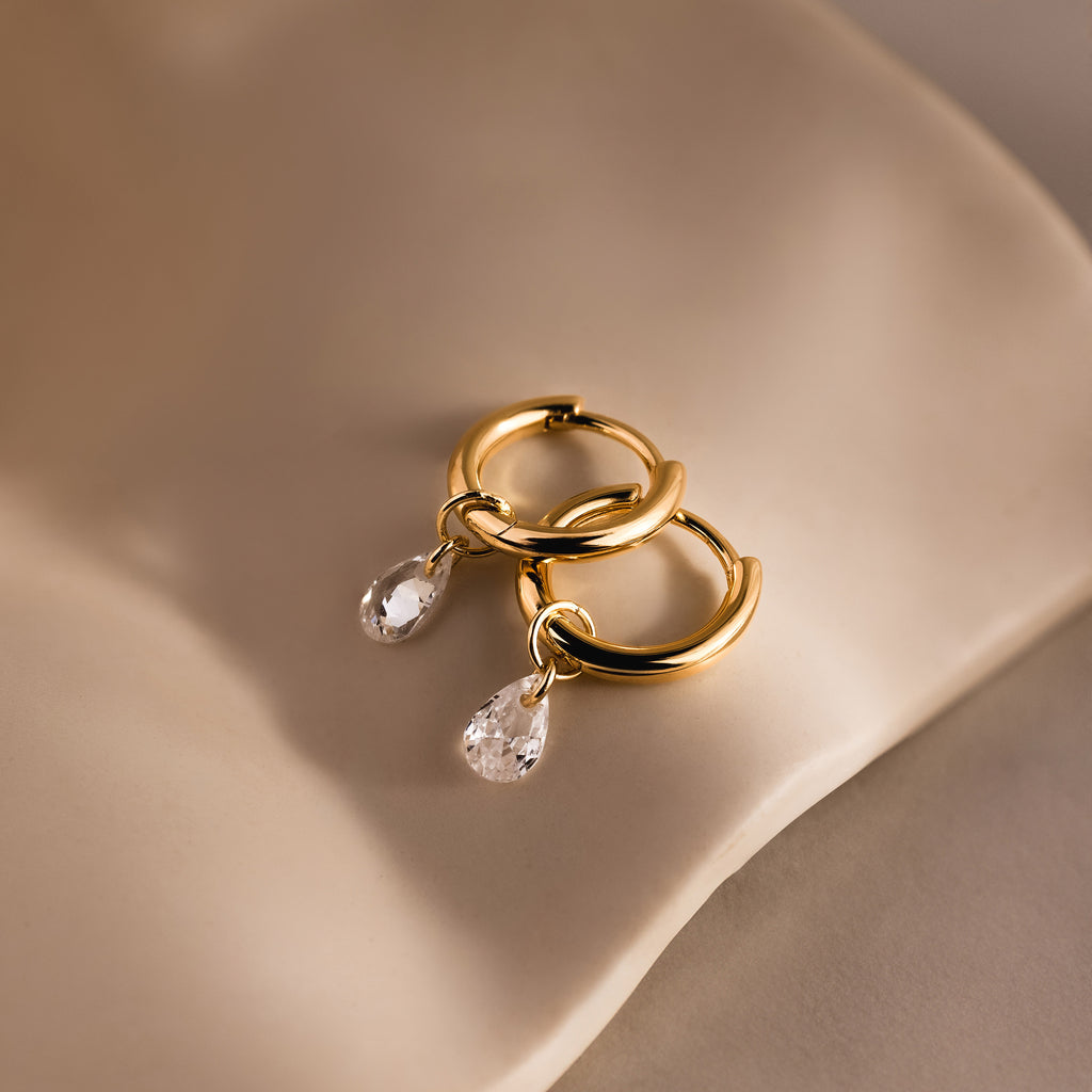 Diamond Raindrop Huggies in 18K Gold