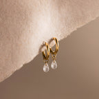 Diamond Raindrop Huggies in 18K Gold