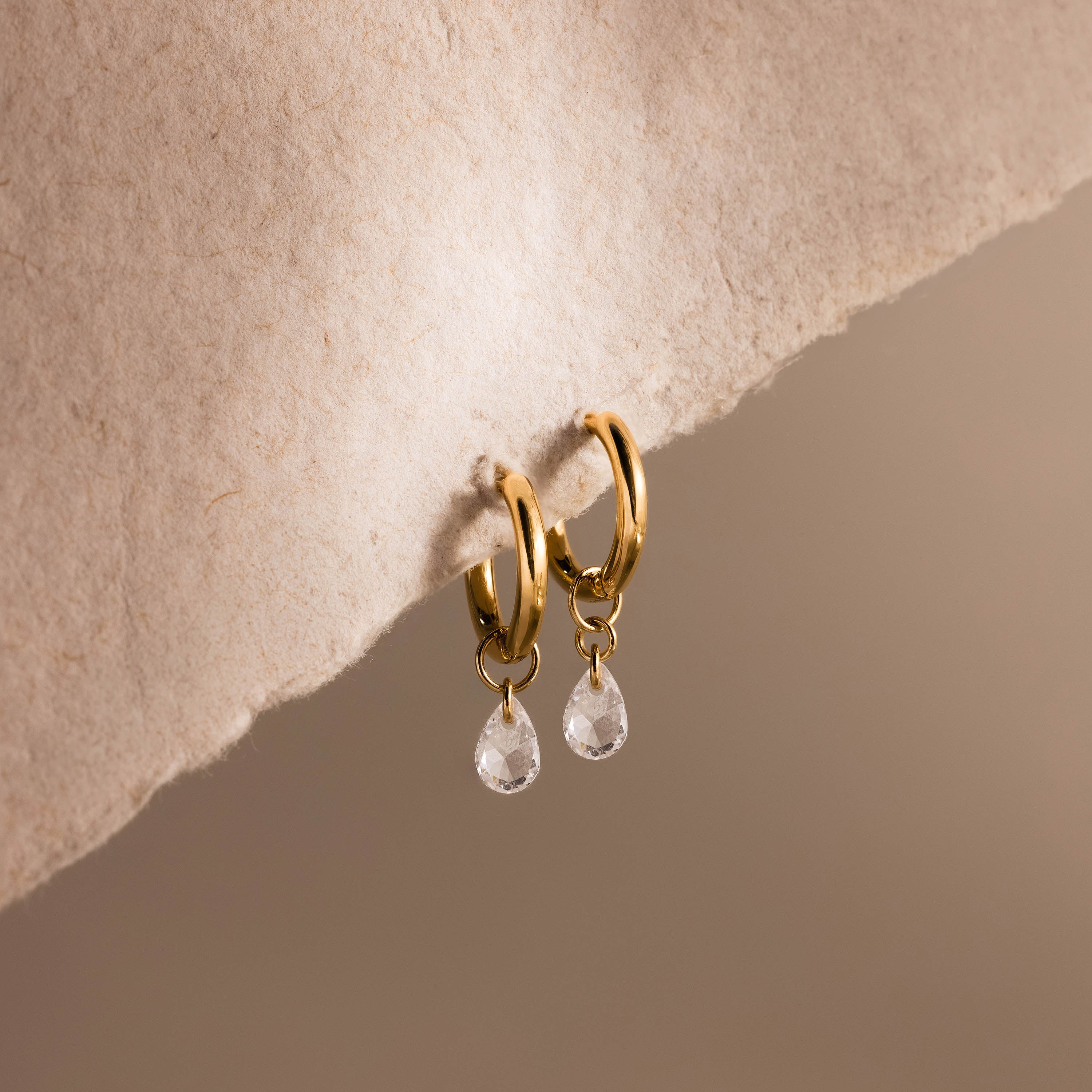 Diamond Raindrop Huggies in 18K Gold